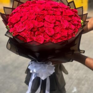 100 red rose bouquet with black paper